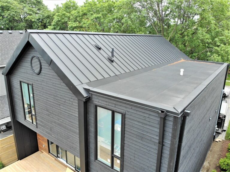 The Architecture of Resilience: A Technical Analysis of Low-Slope Roofing Systems